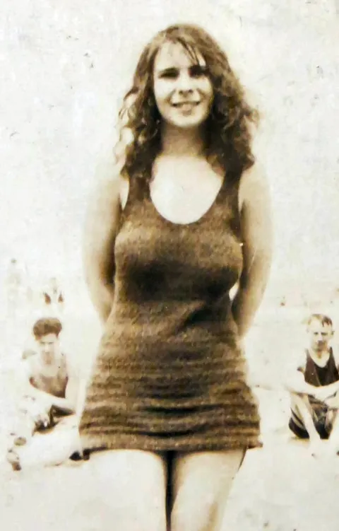 This woman on the beach has a very contemporary look about her despite the fact the photo is from the mid 1920s