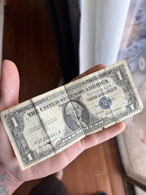 I paid cash for some food and was given a silver dollar certificate as change