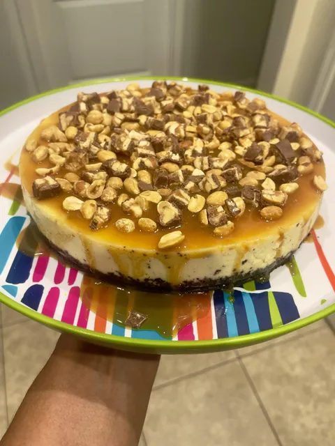 [I ate] homemade Snickers cheesecake compliments of my next door neighbor.