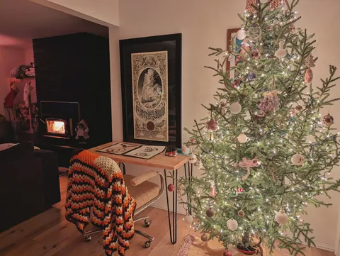 Had a pretty good snowstorm here today. Got cozy painting by the fireplace. 🔥