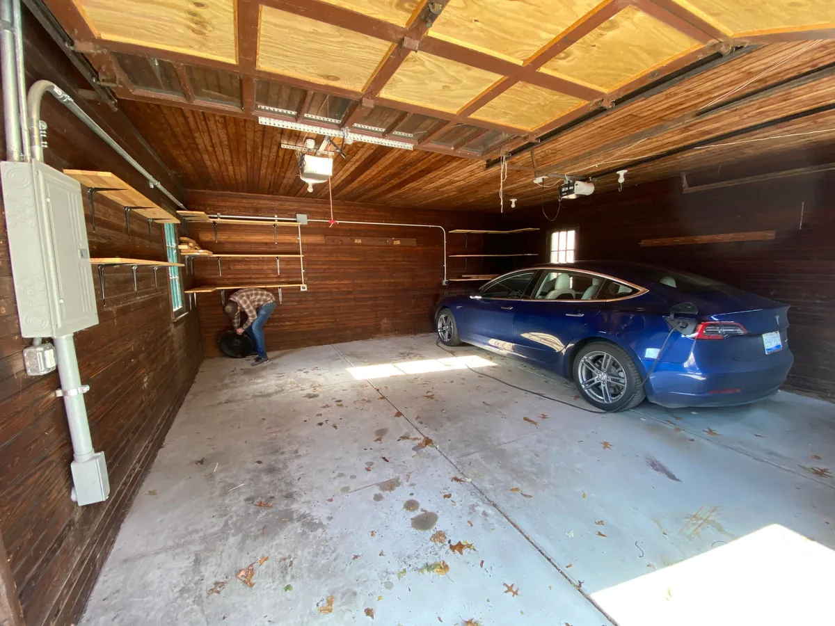 Just had the time to Spring Clean and since we finally finished the concrete floors and got cabinetry installed, I wanted to share! Here is our new, 1920s-styled garage in Detroit with a custom attic elevator, our architectural drawings and images of the original 1927 garage we replaced.