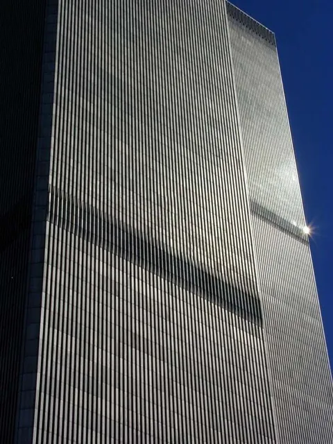 Photos that show the facade of the original World Trade Center . . .