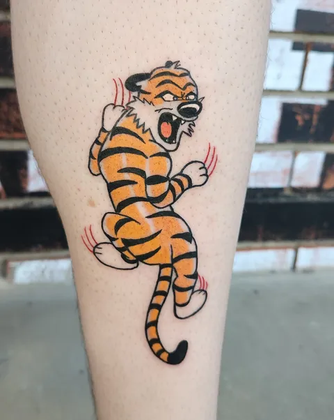 Traditional Hobbes by Ashlie Conyers at Hard Times tattoo gallery in Auburn CA.