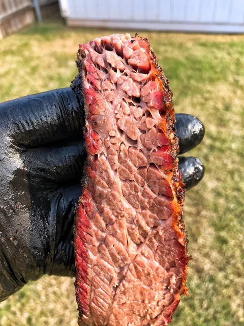 A homemade smoked brisket point. Meat butter.