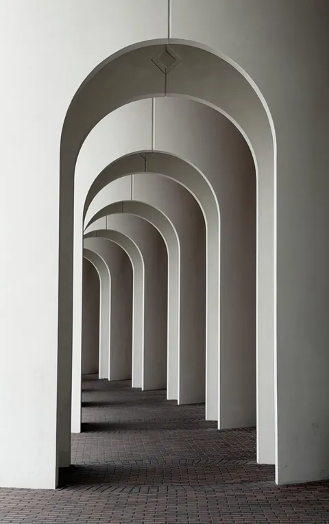 ITAP of a walkway of arches at Christopher Newport University.