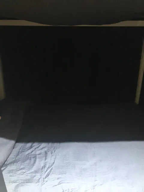 My new four-poster bed with curtains that actually close.