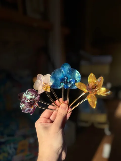 I grow flowers and turn them into jewelry for a living
