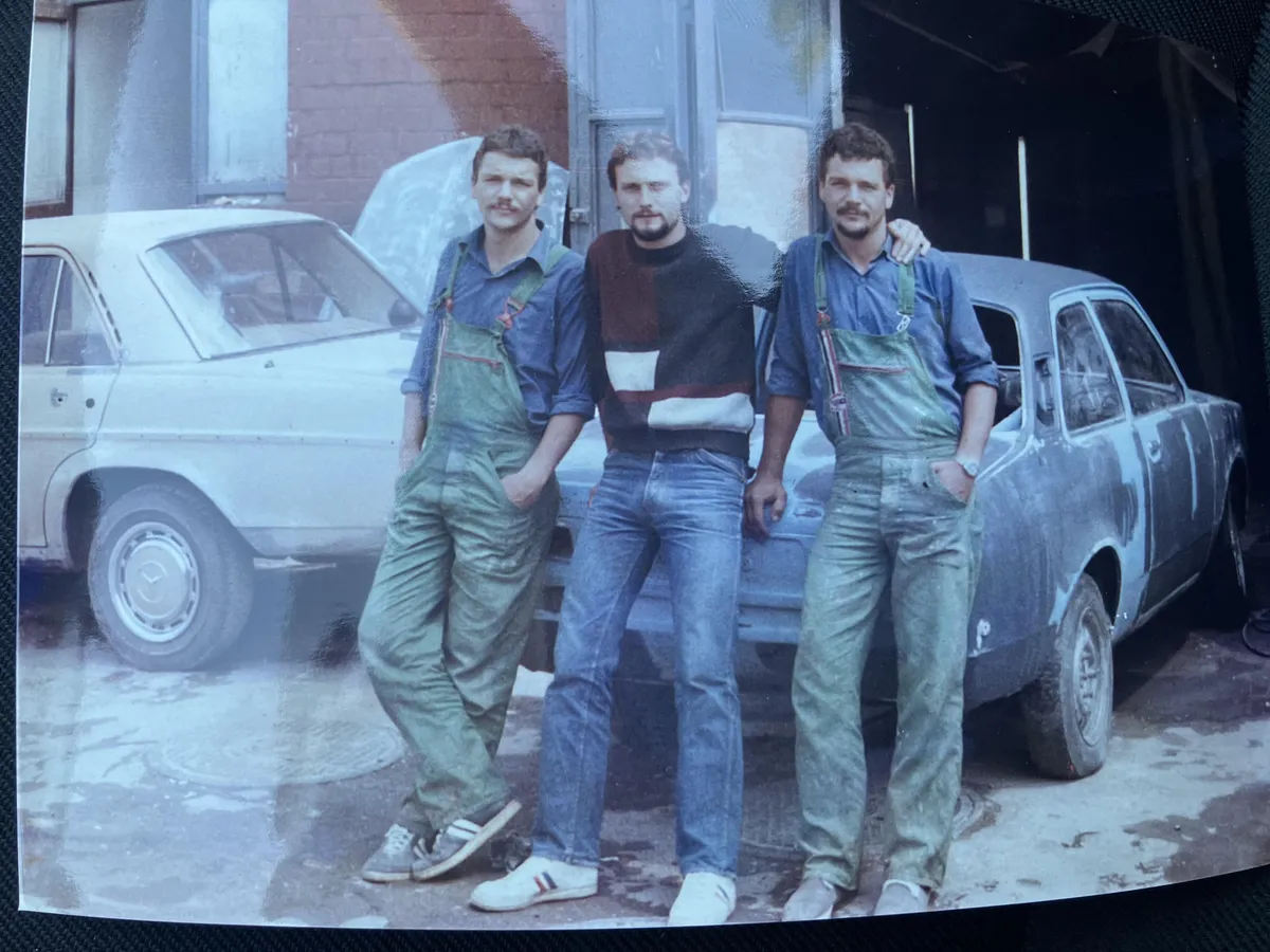 My dad at 23 (in the middle)  with his best friends who were twins during communist Romania 1986