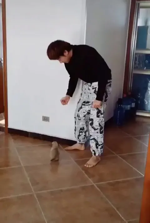 Dance battle: puppy vs human