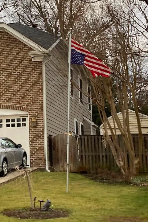 Flag flying upside down outside Justice Samuel Alito's house three days before Biden's inauguration