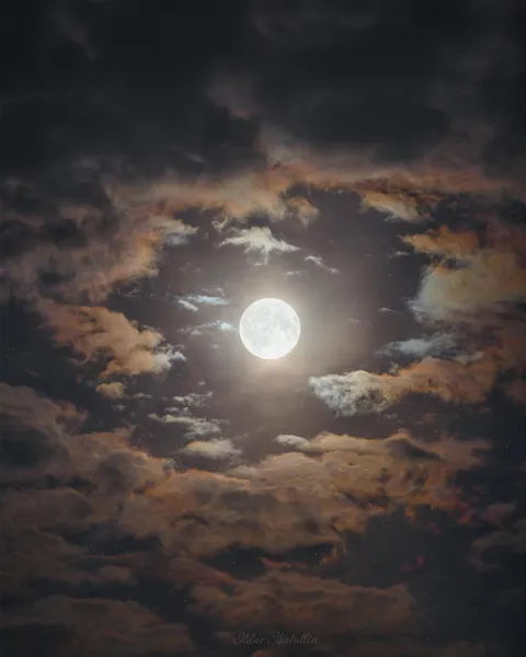 Harvest Supermoon surrounded by heart-shaped clouds (HDR Composite) [OC]