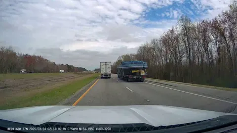 [oc] Truck getting passed on the right by oversized load. Can’t see  tire sitting in the road