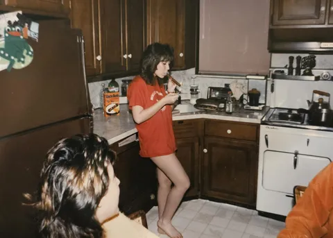 My mom smoking a cigar, 1985