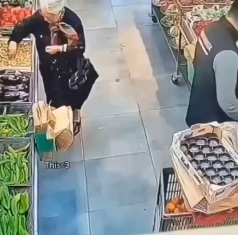 The old lady and this supermarket worker have a routine where they standoff with each other.