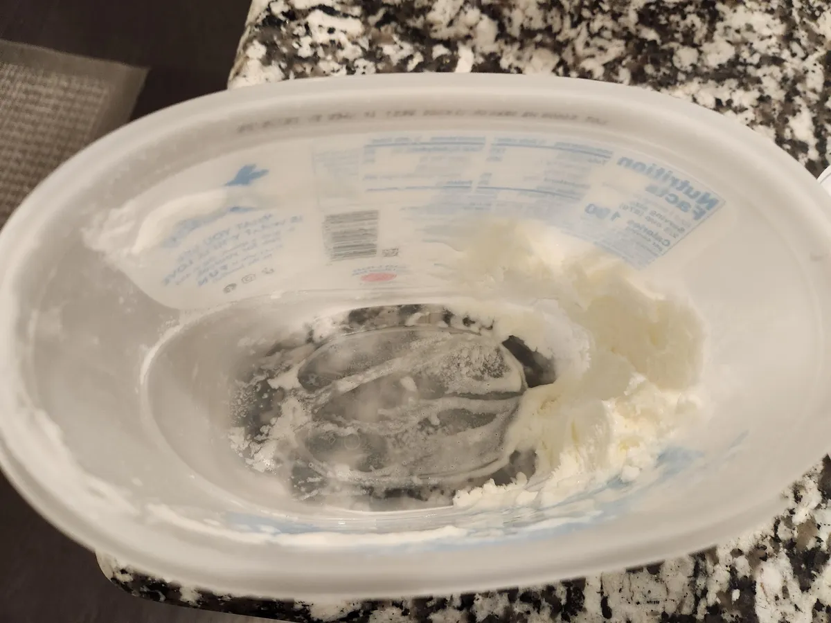 The amount of ice cream my teenager left to avoid the responsibility of throwing the container away