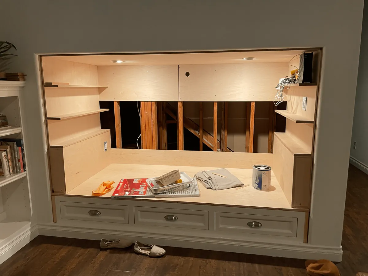 We transformed our 90s entertainment center in a reading nook