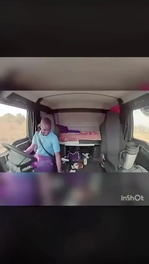 Highway robbers take shots at a moving truck - driver does well to keep it steady!