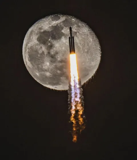 Falcon Heavy transits rippling Moon