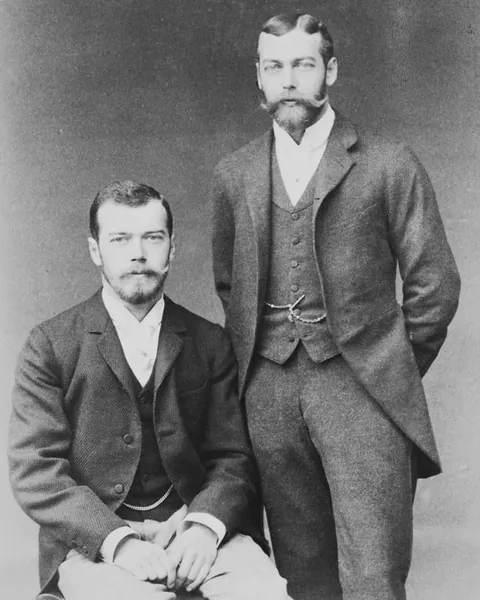 Czar Nicholas II of Russia and King George V of Great Britain were first cusins with a remarkable likeness to each other. George is the one with the side part Photos circa 1900s-10s