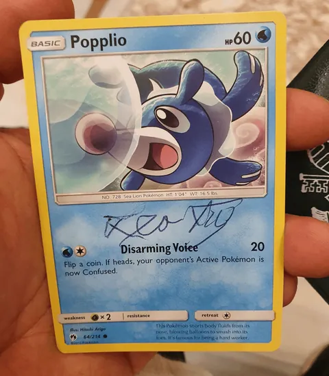 A man got his “Popplio” pokémon card autographed by Pope Leo