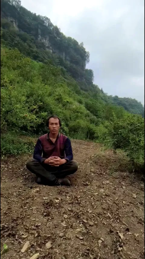 this man taking a picture with his plants as they grow (time-lapse)