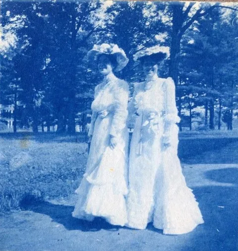 An unnamed young woman recorded her senior year at Asheville Female College in a photo album, Asheville, North Carolina, 1902. It includes a dorm room, group shots of friends, playing in snow, a visit to the mountains, their final midnight party before graduation, and graduation day itself.