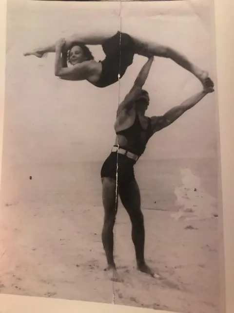 My contortionist great grandma and her father, welterweight boxing champion, playing around at the beach 1920's 