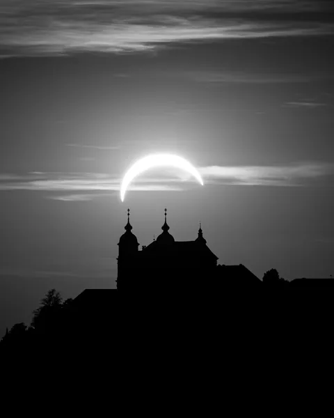 Crescent over church