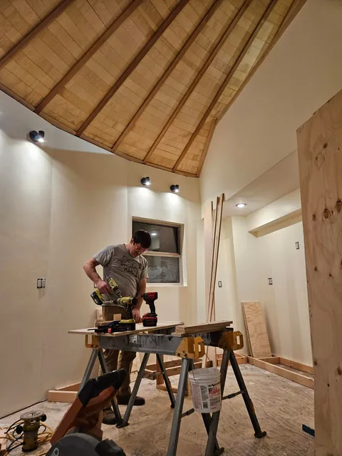 Spent several years building a complete 1300 sq ft roundhouse from top to bottom with my wife, including all framing, electrical, plumbing, HVAC, etc. By far the worst idea we've ever had, and so happy to be in it finally.