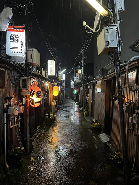 A rainy alley filled with tiny izakayas. Kanazawa, Japan.