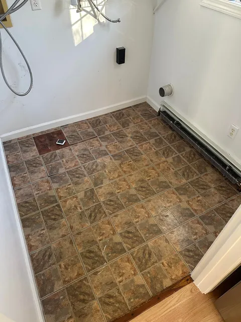 Washer flooded my laundry room so I learned how to tile.