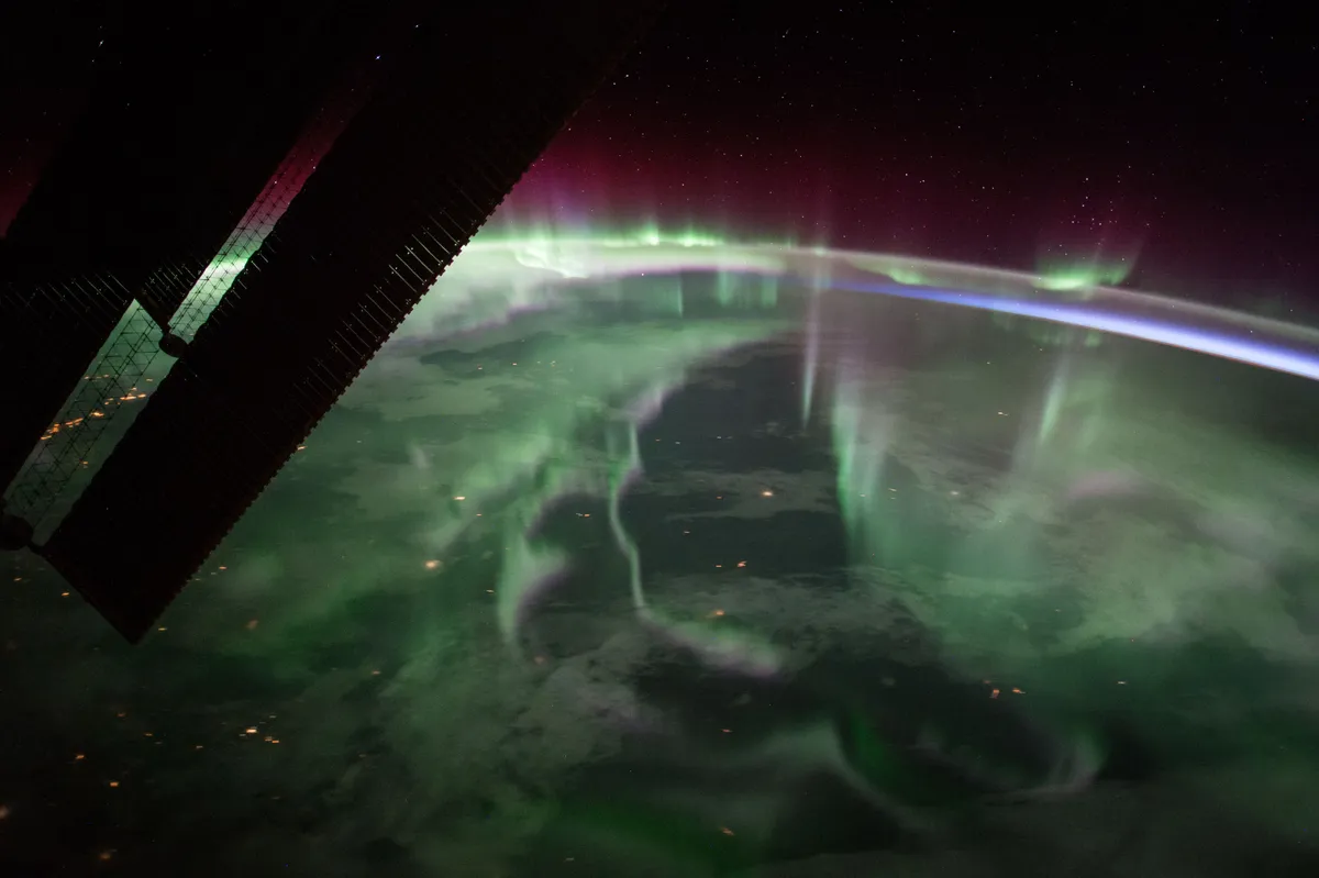 A spectacular aurora borealis, or “northern lights,” over Canada is sighted from the International Space Station near the highest point of its orbital path