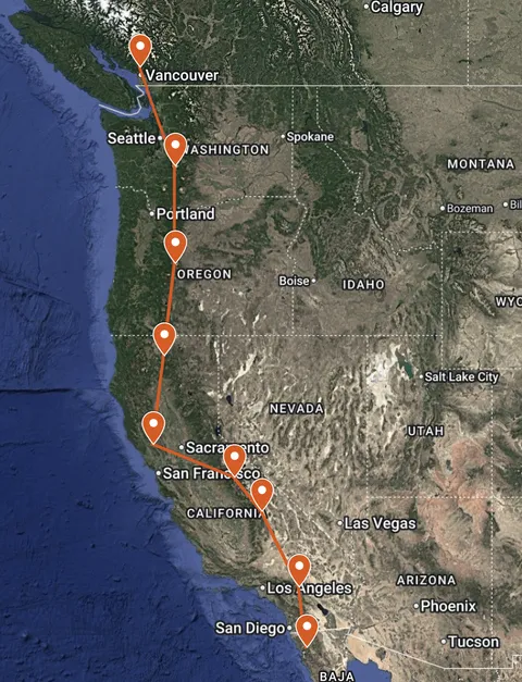 In theory someone standing in Mexico could see someone standing in Canada via only 7 well-placed perfect mirrors on 7 mountains within the United States and a good telescope