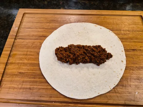 Beef, bean, and rice burritos [Homemade]