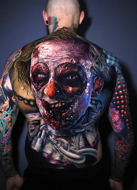 Tattoo artists Torstem Malm, Adrian Ciercoles, Moriel Sero and Kätlin Malm spent two days on the moving clown tattoo.
