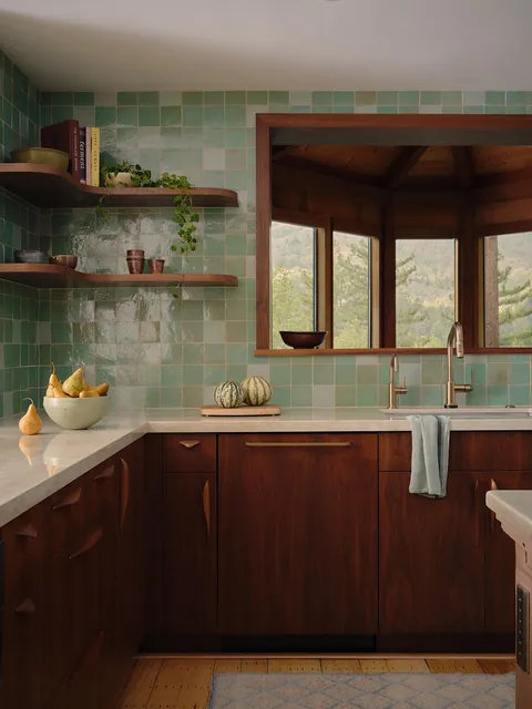 Zellige tile backsplash kitchen with an opening showing an ocatgonal room in a renovated Mid-century residence, Mill Valley, Marin County, California [1080x1440]