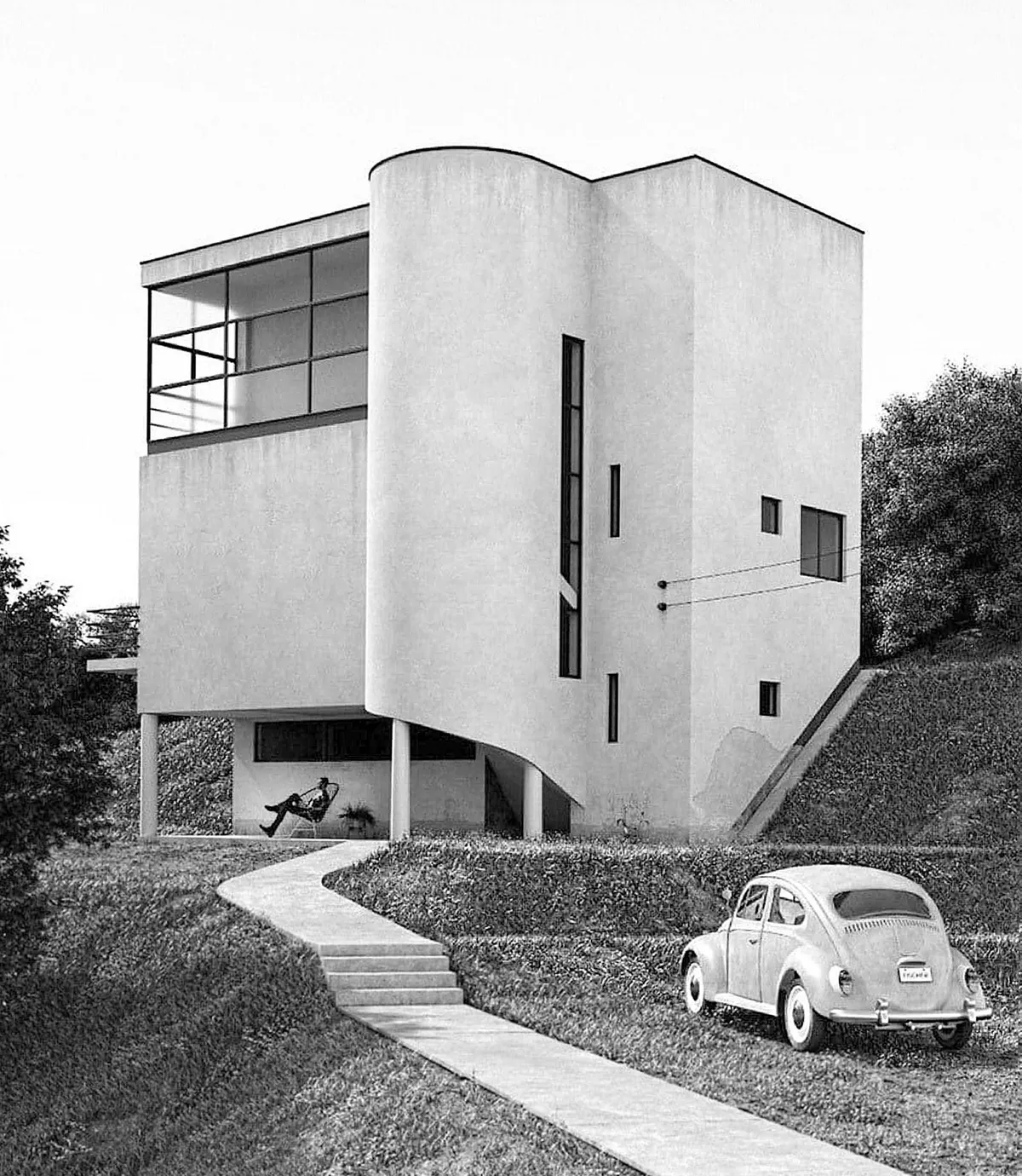 In 1934, the Bauhaus-influenced Hoffmann House was built for a Hungarian statistics scientist and his Volkswagen. Located in Budapest, the geometric structure was designed by architect József Fischer. (Photographer unknown; digital restoration by Modernist Collection)
