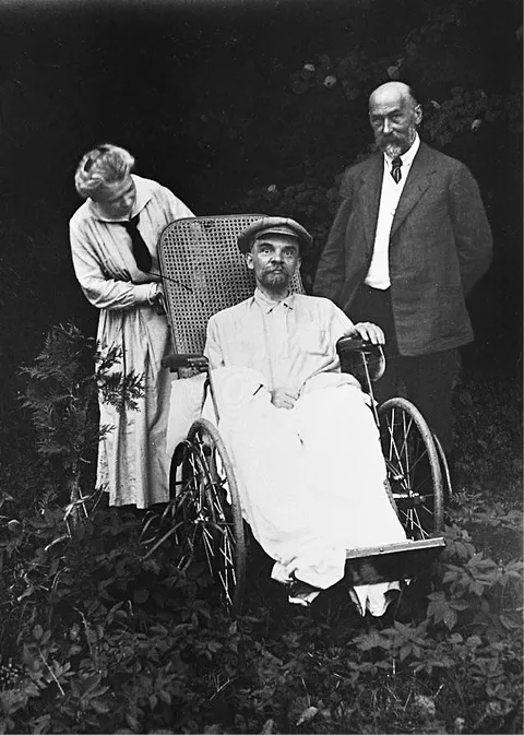 One of the last photographs of Vladimir Lenin. Taken in Gorki May, 1923. Beside him are his sister Anna Ilyinichna Yelizarova-Ulyanova and one of his doctors A. M. Kozhevnikov.