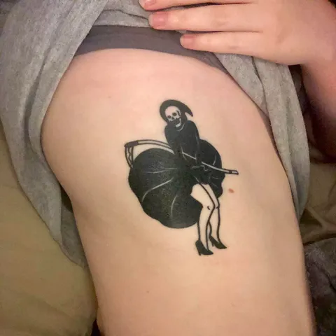 my first tattoo done on my rib!! done by z at dork tattoo shop in louisville, ky