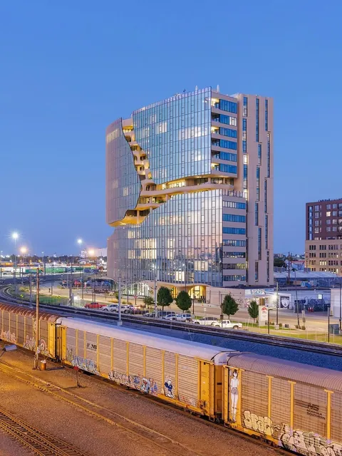 One River North: A Cracked-Open Canyon in the Heart of Denver. By MAD