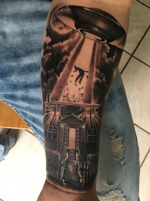 My dog, myself and the house I grew up in. By Darrel Smith at Electric Arts Tattoo Studio, Grande Prairie AB.