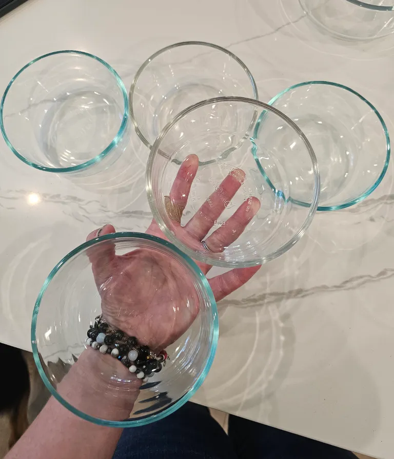 My Pyrex dishes from the same set, all the same size made in USA are different "colors" of glass