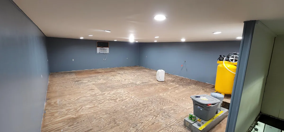 Finished the 2nd floor of my garage into a Home Theatre and Gym.