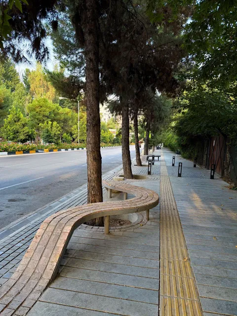 Brickwork on sidewalk that turns into a bench [Shiraz, Irann]