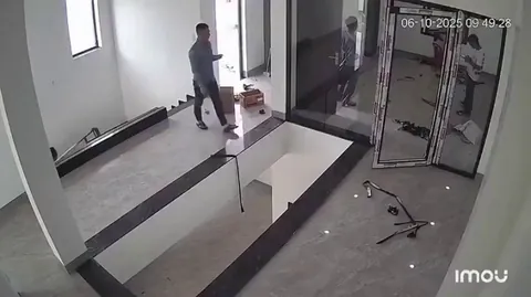 Man fells from floor while looking at phone