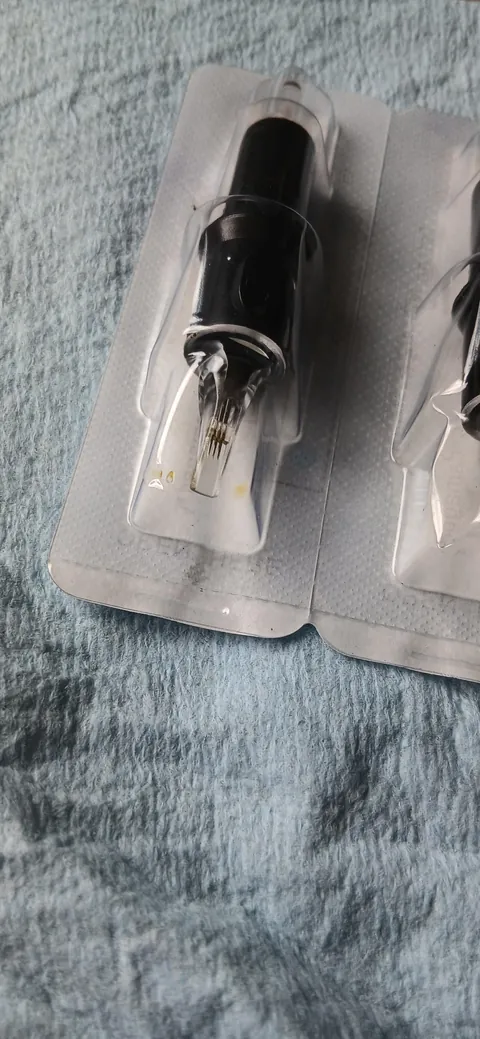Does anyone know what this yellowish liquid is in unopened tattoo cartridges?