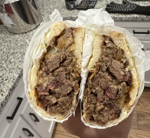 [homemade] brisket cheesesteak on garlic naan