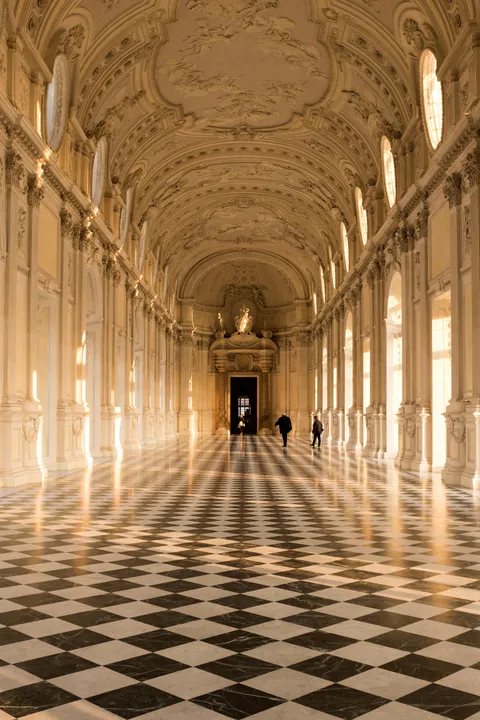 Palace of Venaria, Turin, Italy. The sunlight hitting the marble tiles is truly marvelous, pictures don't do it justice.