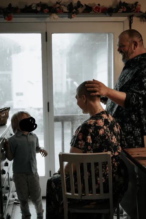 Shaving my head after week one of chemo