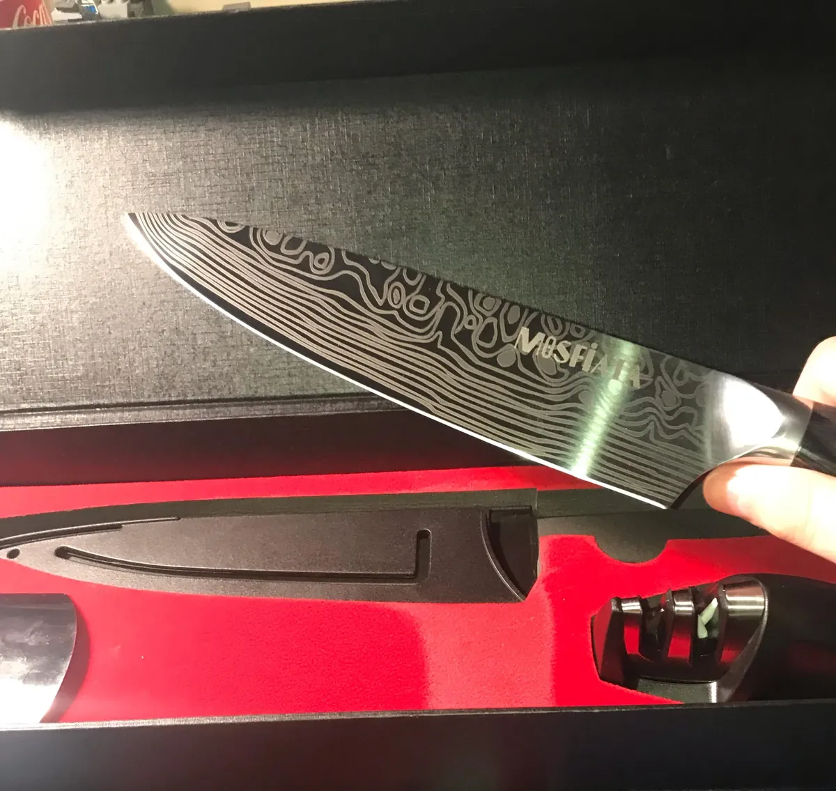 My teacher got me a knife for grad.